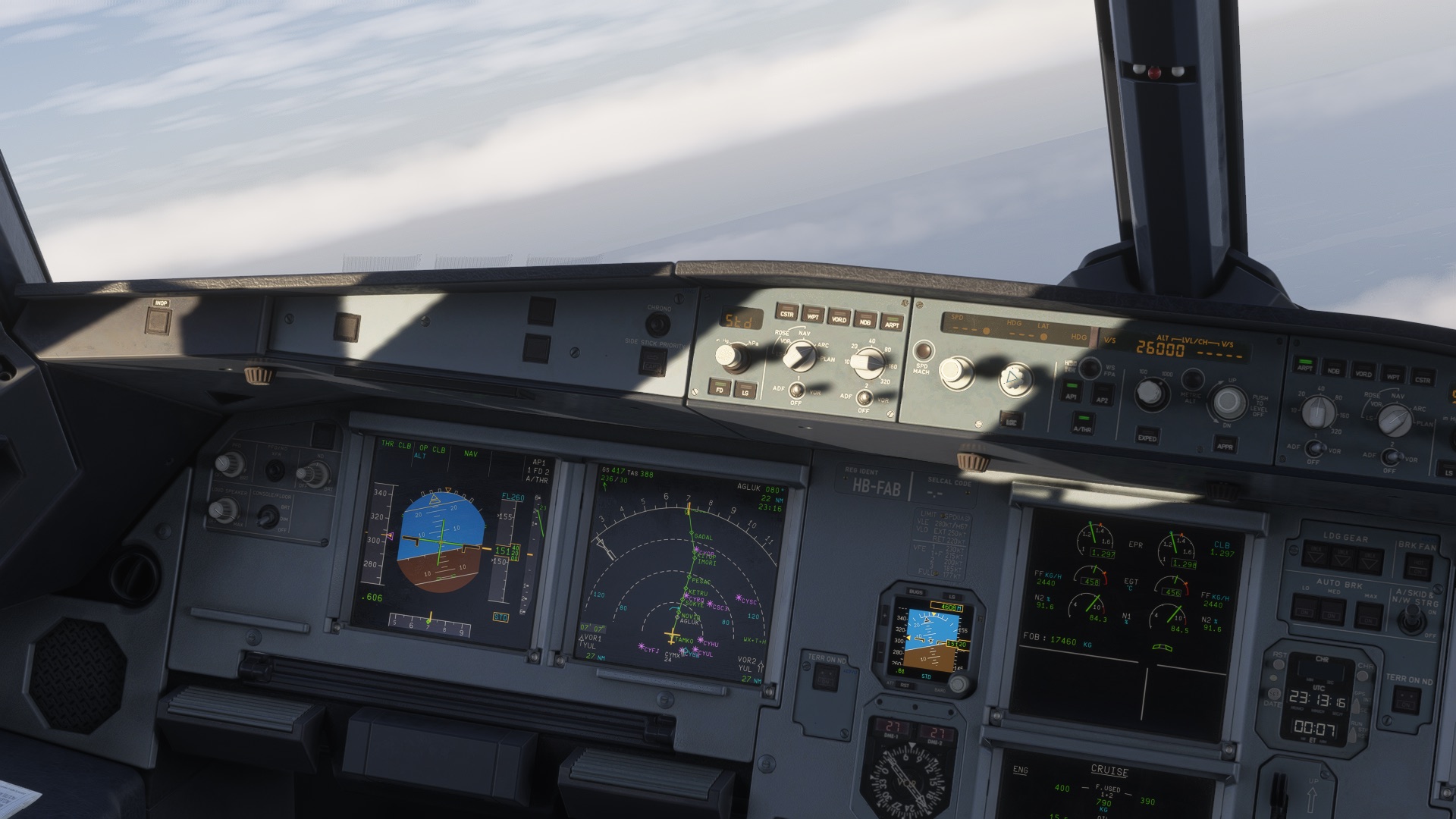A320 glareshield and displays above a solid cloud deck