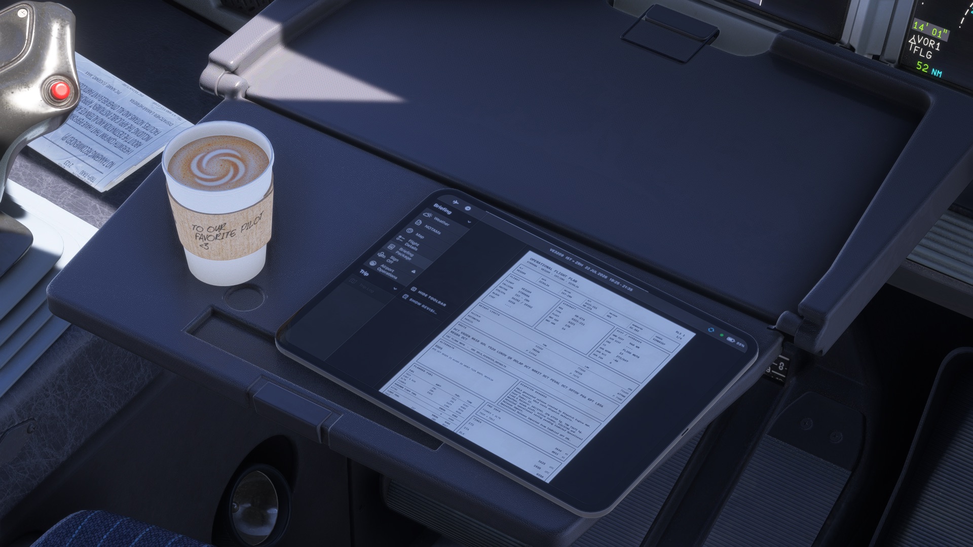 Operational flight plan and coffee on the flight deck table